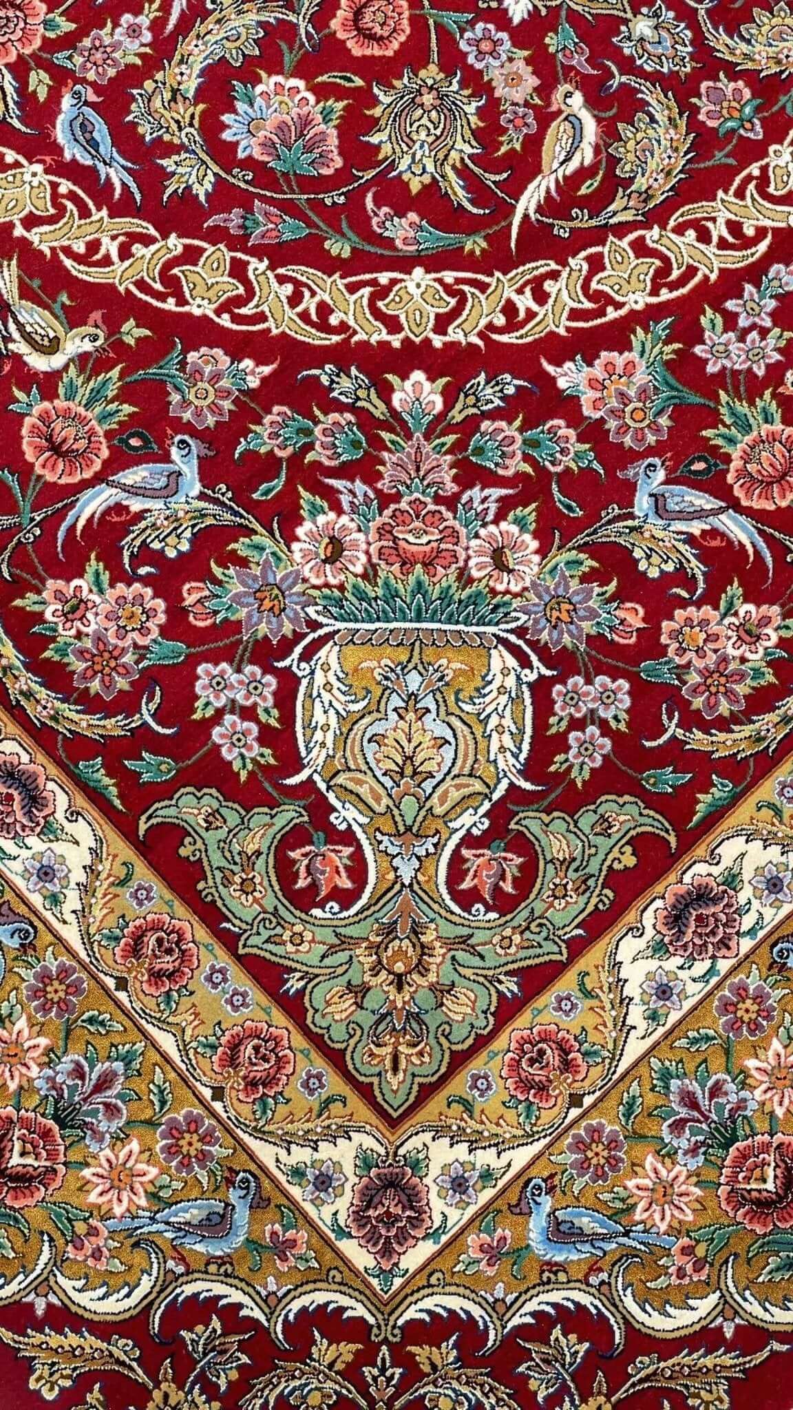 "Persian rug with intricate floral designs, 240 cm x 160 cm, handwoven with wool and silk flowers, showcasing exceptional craftsmanship."